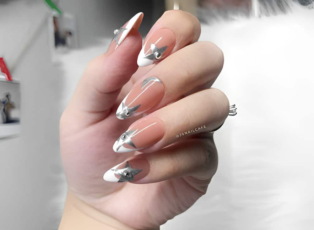 Metallic white French tips.