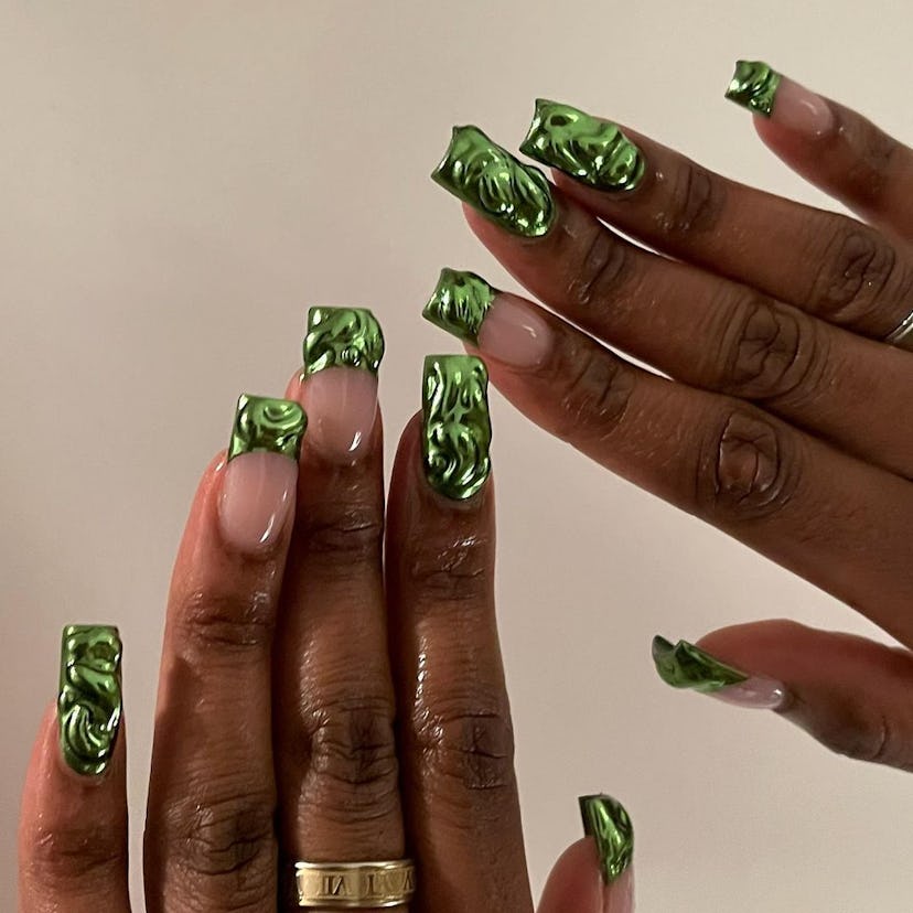 Green chrome manicures give 