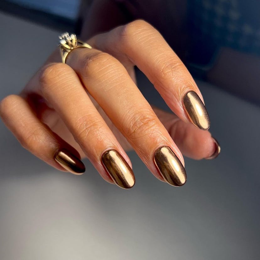 Gold chrome nails are perfect for Leo season 2024.