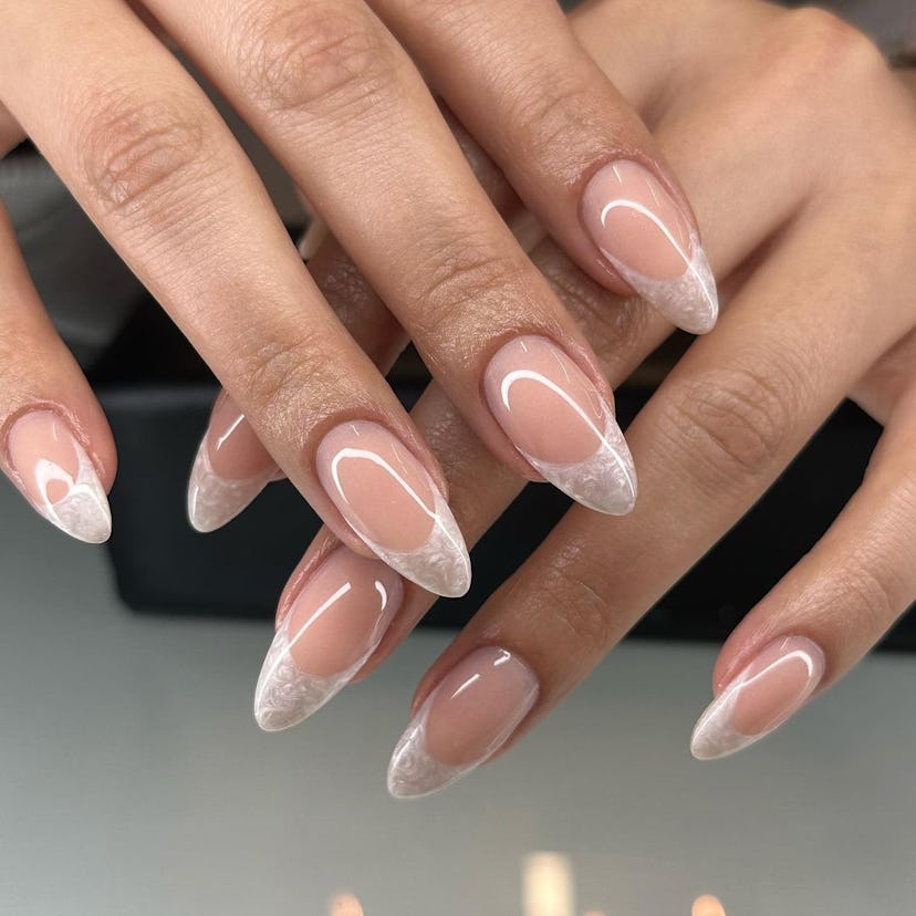 Try pearlescent oyster French tip nails.