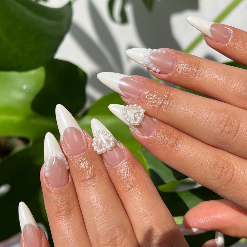 Try French tip nails with pearl adornments.