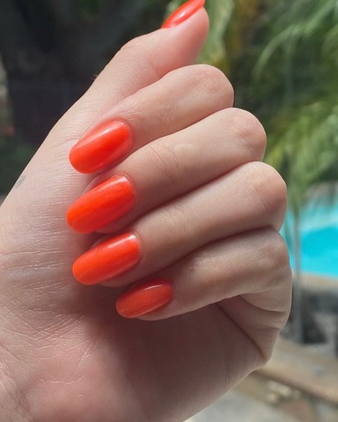 selena gomez nails orange