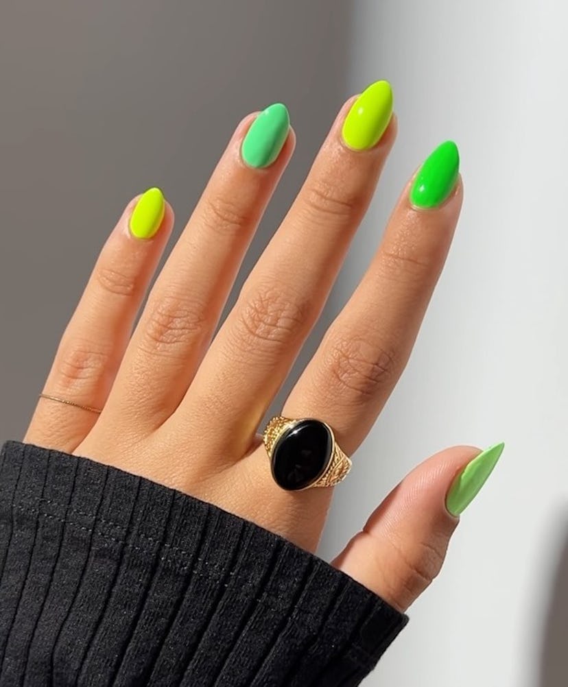 Green Skittle nails give 