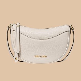 Flat lay of Michael Kors bag white