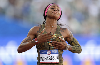 shacarri richardson shows her nail art while running