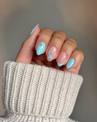 @iramshelton baby blue heart nail art