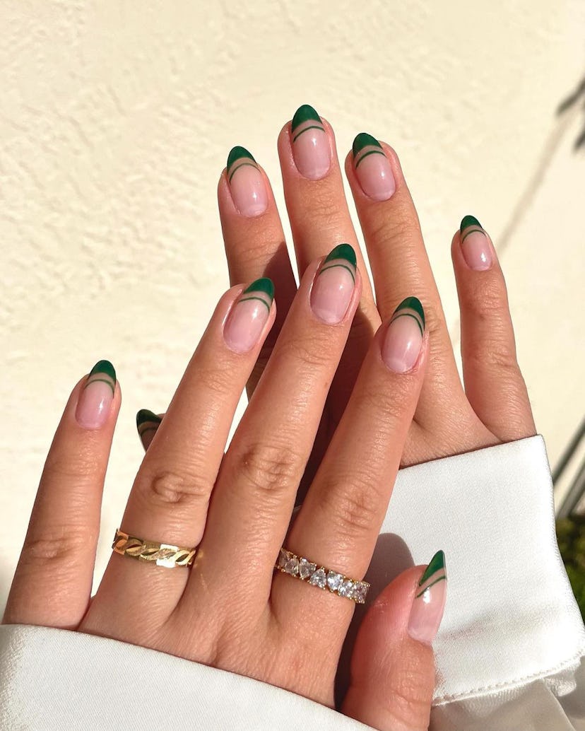 Emerald green French tip nails are perfect for Virgo season 2024.