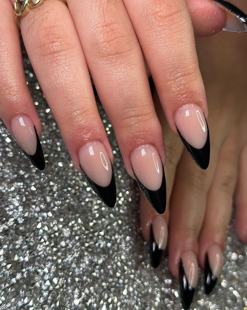 Black French tip nails are perfect for Virgo season 2024.