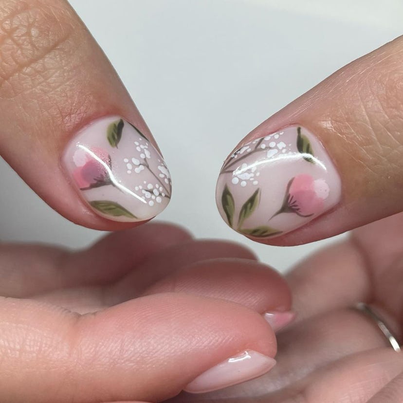 Pale pink floral nails are perfect for Virgo season 2024.