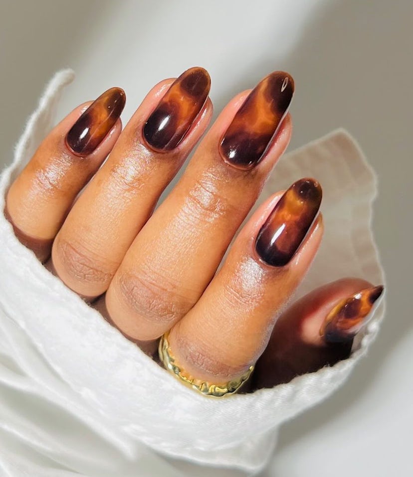 Tortoiseshell print nails are perfect for Virgo season 2024.