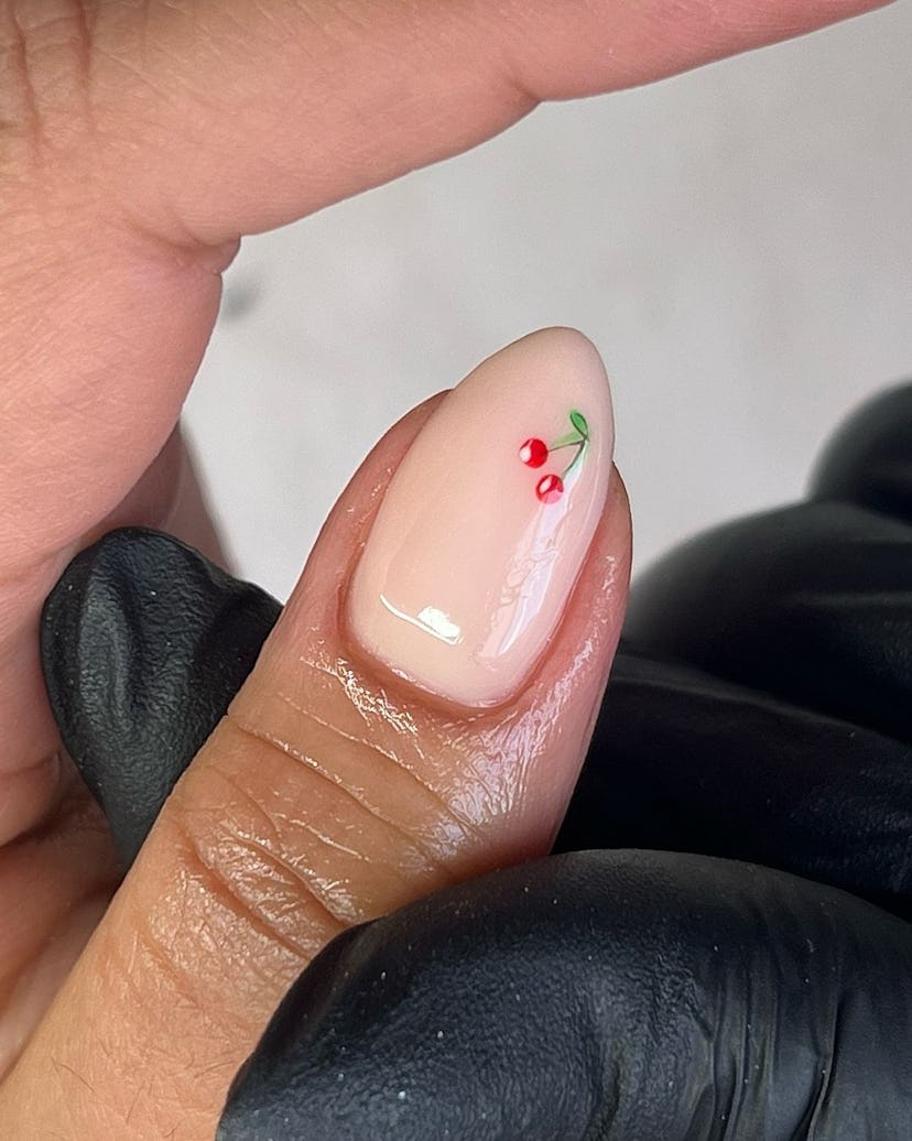 Cherry nail art designs are on-trend for fall 2024.