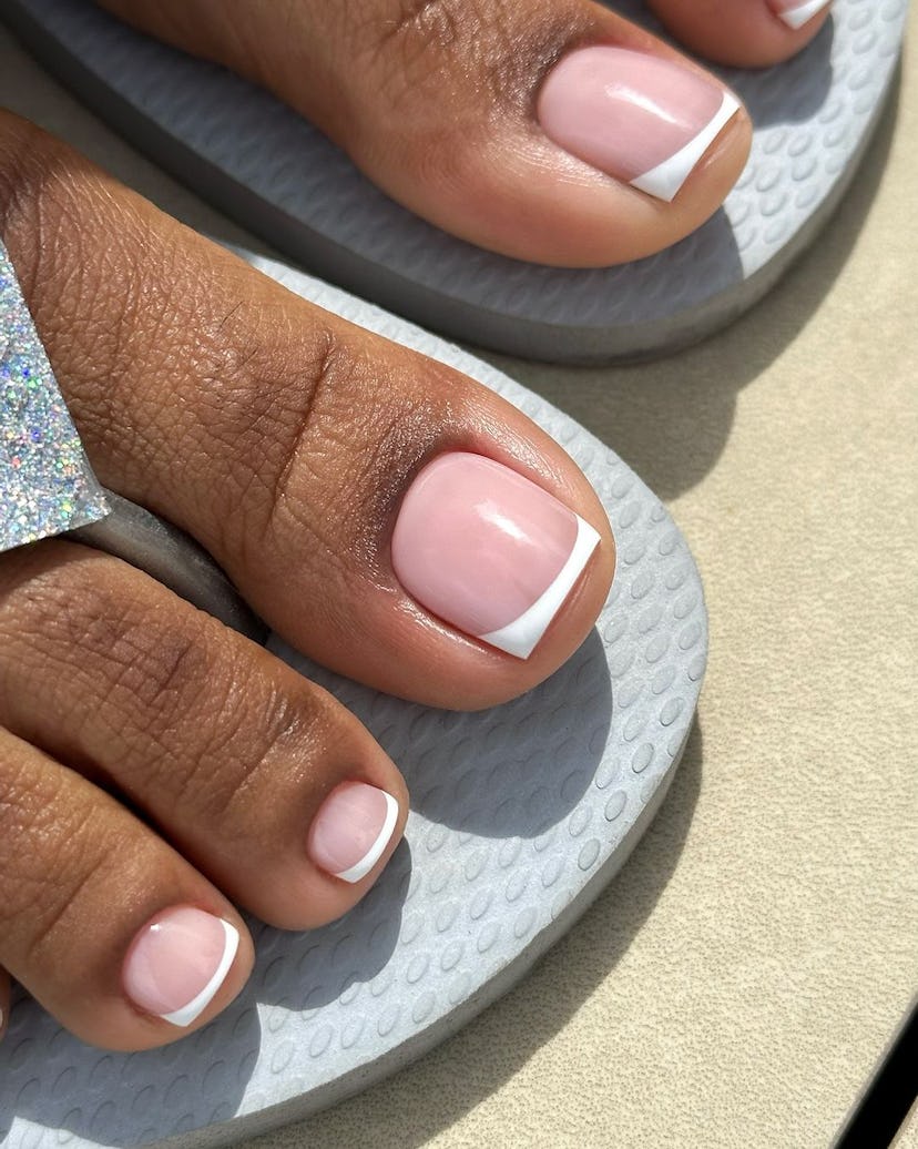 French tip pedicures are on-trend for fall 2024.