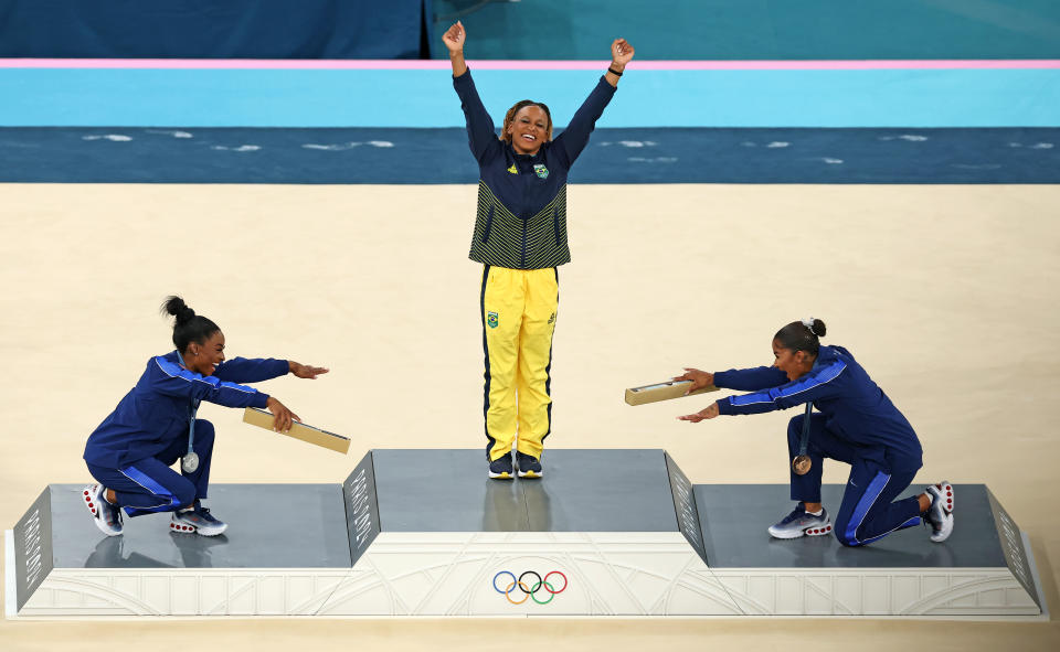 simone biles jordan chiles Rebeca Andrade on the Olympic podium