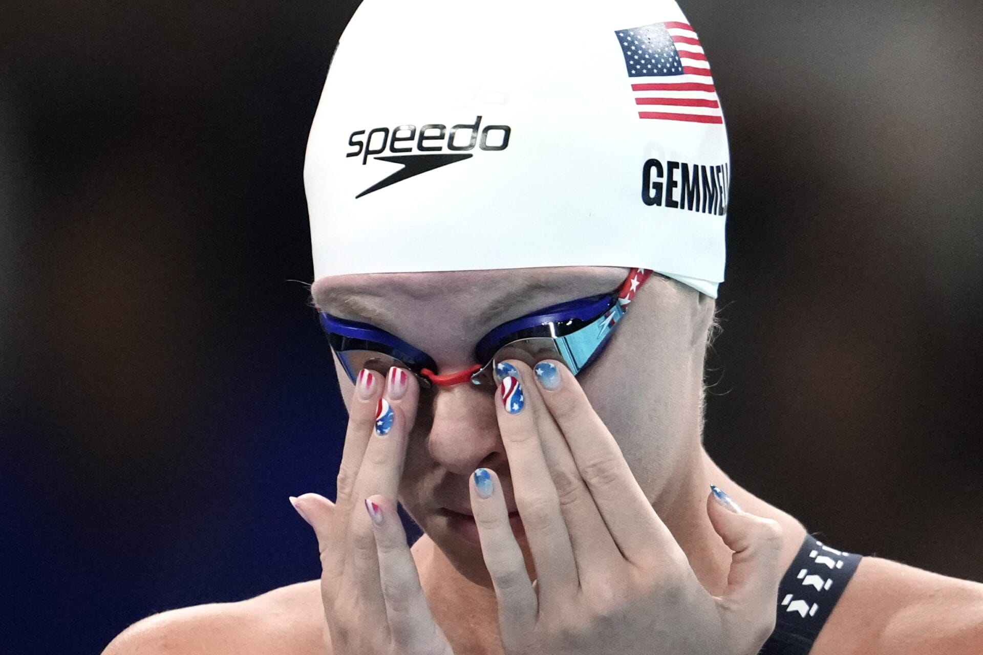 Erin Gemmell, of the United States, prepares to start in her heat in the women's 200-meter freestyle at the 2024 Summer Olympics, Sunday, July 28, 2024, in Nanterre, France. (AP Photo/Matthias Schrader)