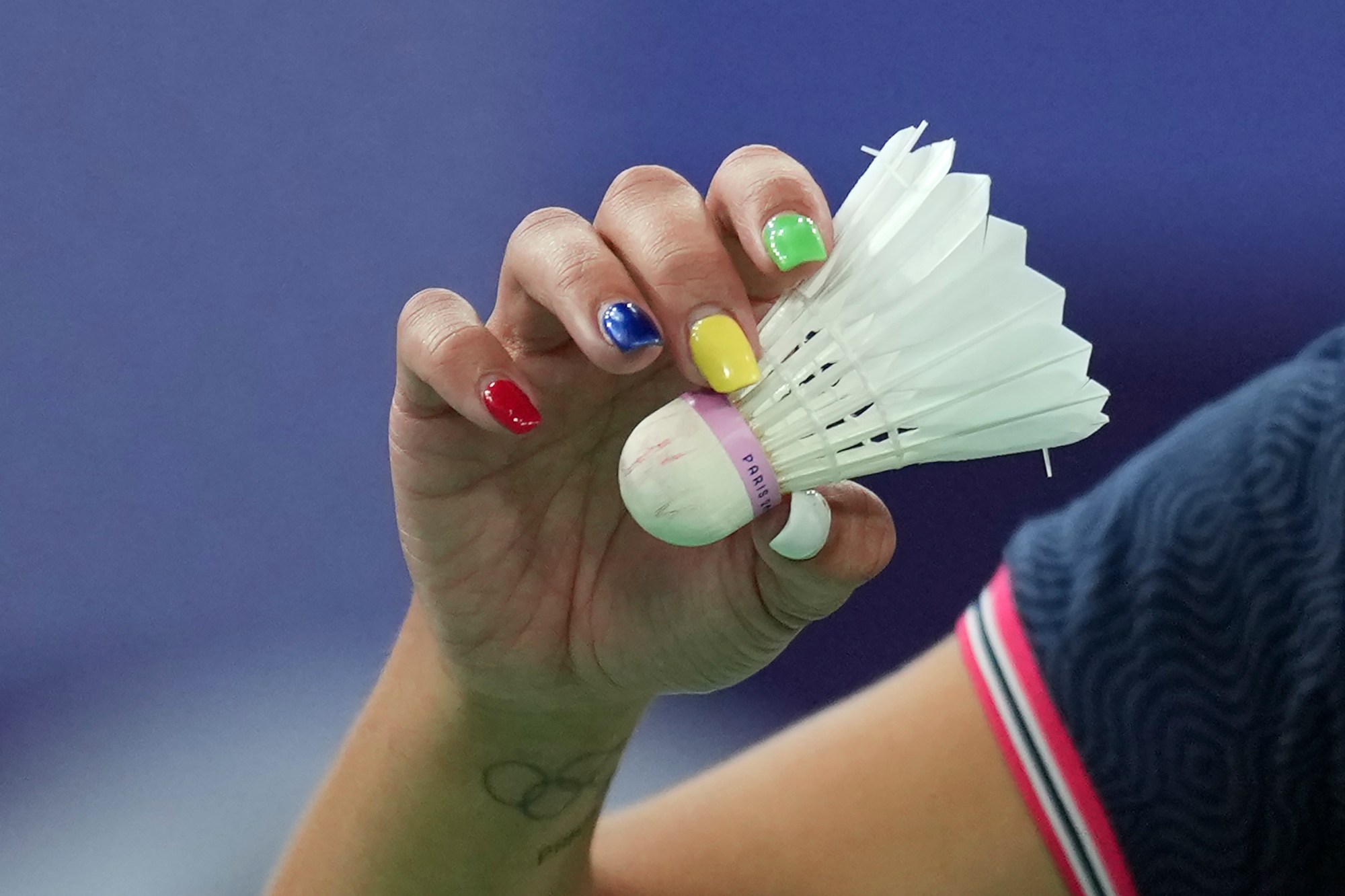 Mauritius' Kate Foo Kune plays against Refugee Olympic Team's Dorsa Yavarivafa during their women's singles badminton group stage match at the 2024 Summer Olympics, Monday, July 29, 2024, in Paris, France. (AP Photo/Kin Cheung)