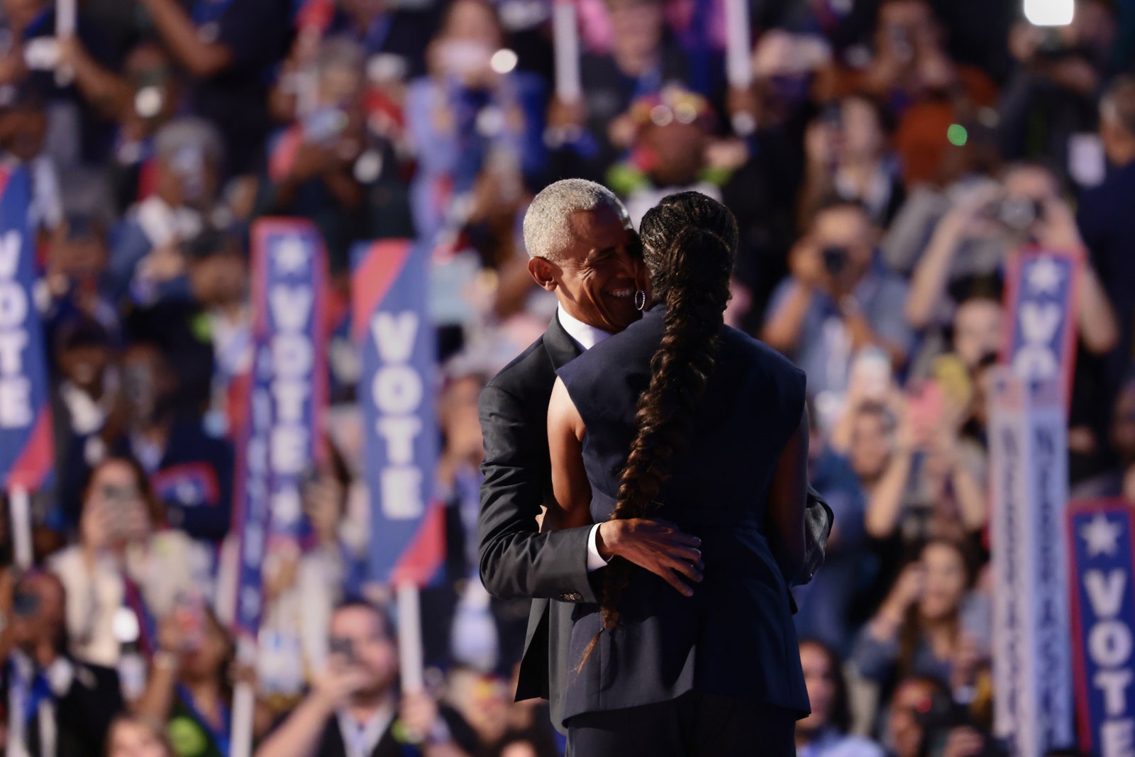 Image may contain Barack Obama Hugging Person Adult and People