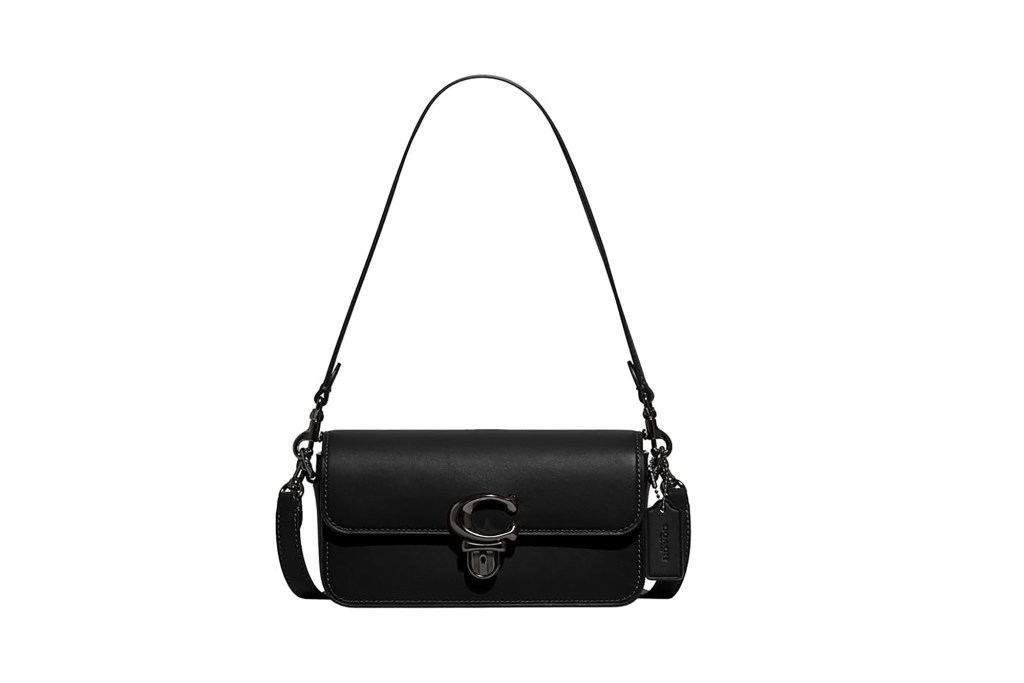 A black purse with a long strap