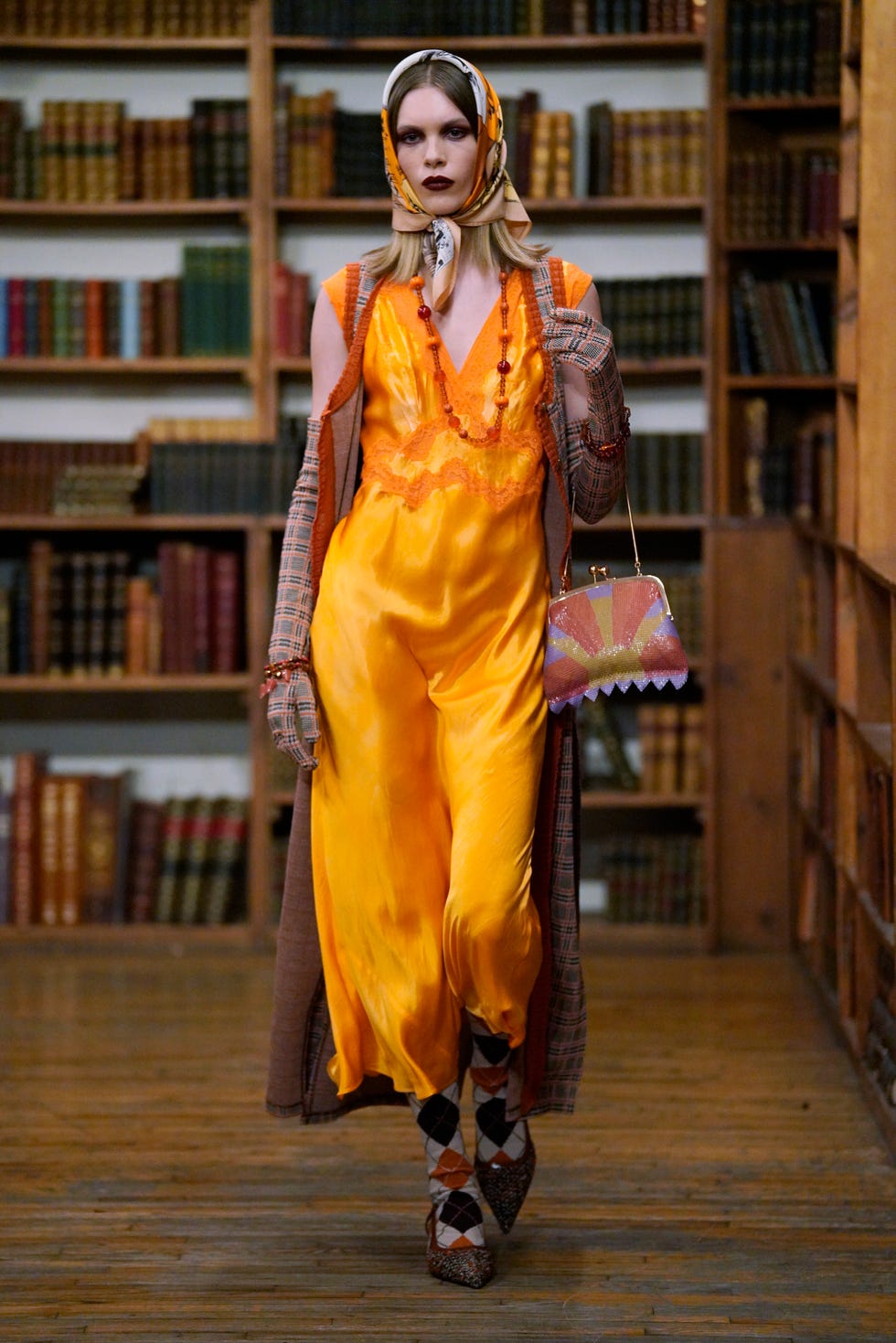 model on the runway at anna sui rtw fall 2024 as part of new york ready to wear fashion week held at the strand book store on february 10, 2024 in new york, new york photo by george chinseewwd via getty images