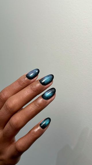 Black and blue cat eye nails