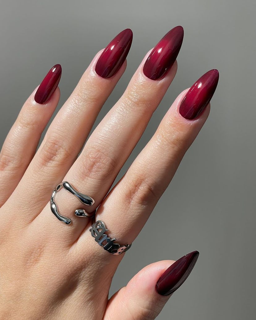 Cherry mocha aura nail are on-trend for fall 2024.