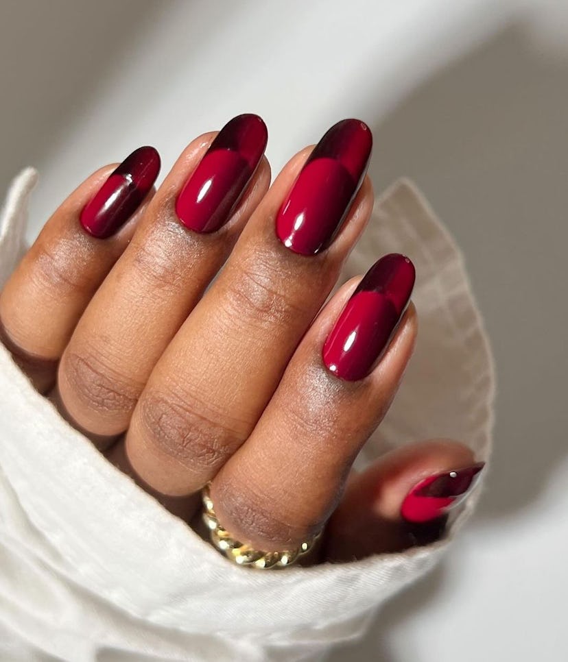 Optical illusion French tip cherry mocha nails are on-trend for fall 2024.