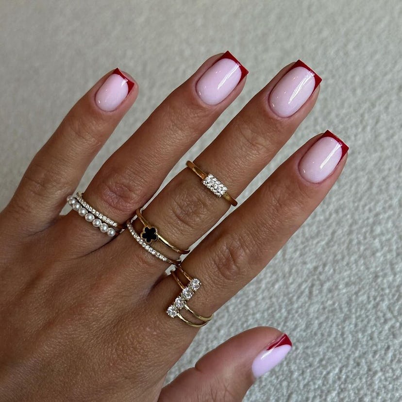 Cherry mocha micro French tip nails are on-trend for fall 2024.