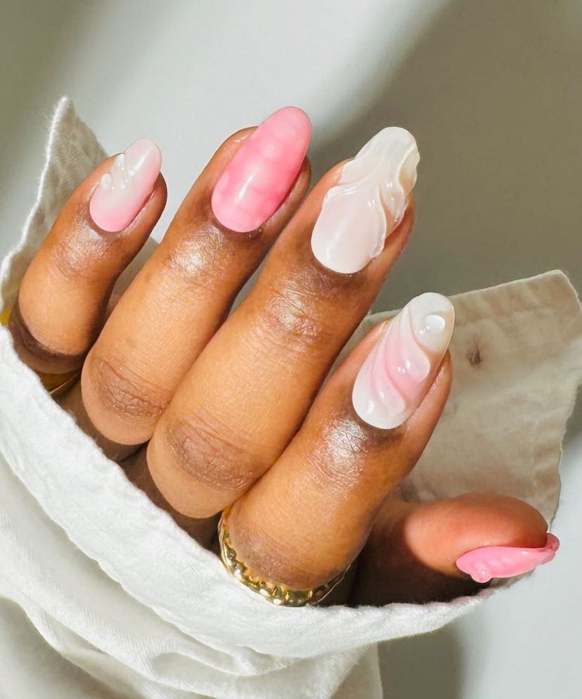 Pink and white nails with clear 3D details are perfect for Libra season 2024.