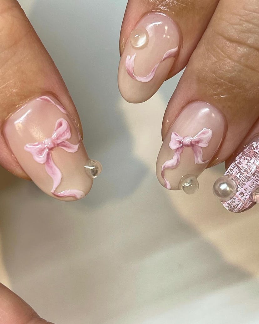 Nails with realistic ribbon art are perfect for Libra season 2024.