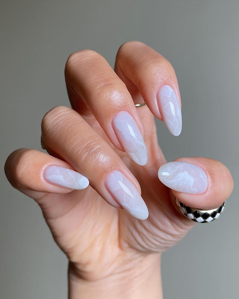 White marble nail art is perfect for Libra season 2024.