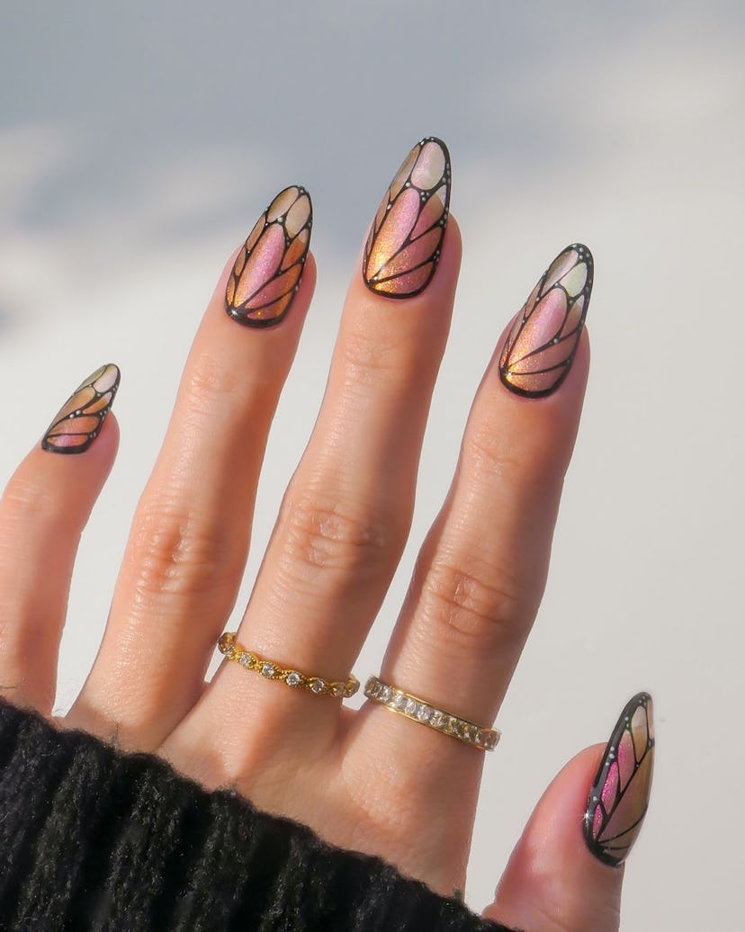 Pink-tinted holographic butterfly wing nail are is perfect for Libra season 2024.