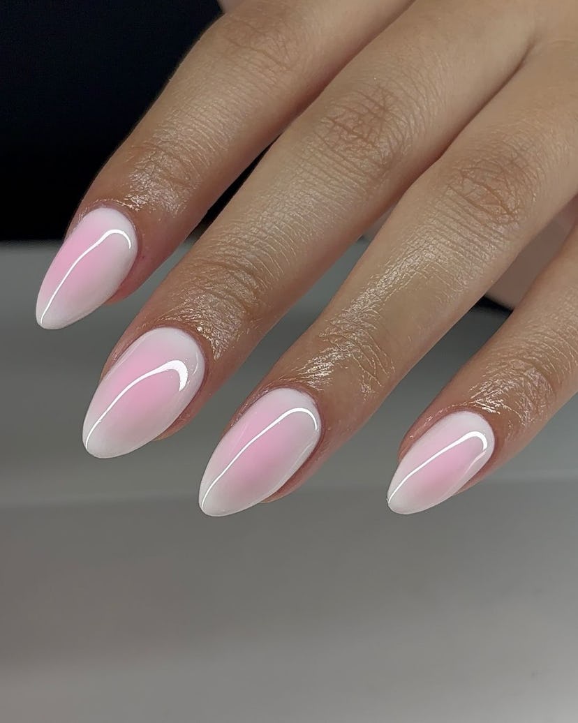 Pale pink and white aura nails are perfect for Libra season 2024.