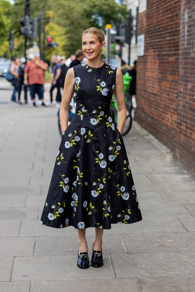 Kelly Rutherford wears dress with floral print outside Emilia Wickstead during London Fashion Week September 2024 on September 15, 2024 in London, England