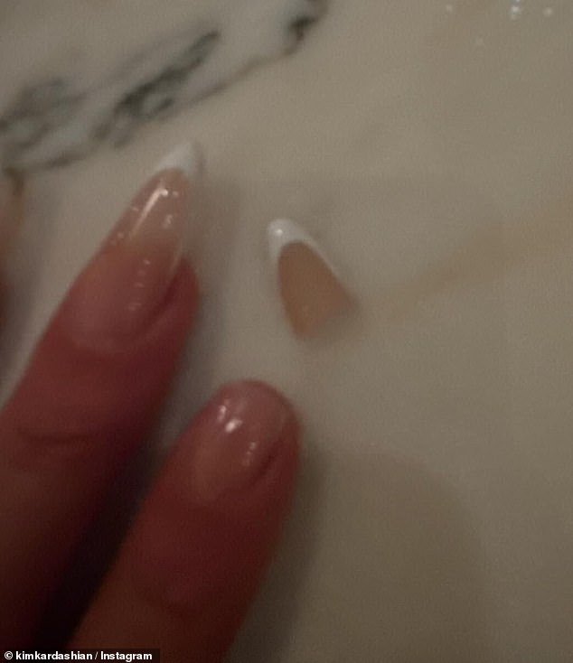 And the reality star also shared a photo of an acrylic nail of hers that fell off