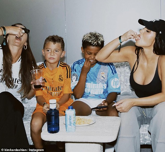 She went on to share a snap of herself with children and a friend as they enjoyed snacks together