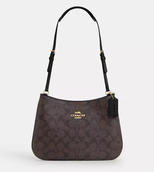 Get the Penelope Shoulder Bag In Signature Canvas on sale at Coach Outlet.