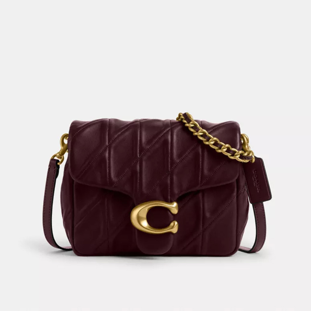 burgundy red coach bag with gold hardware