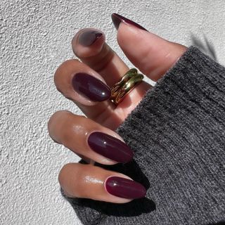 @themaniclub burgundy French tip nails