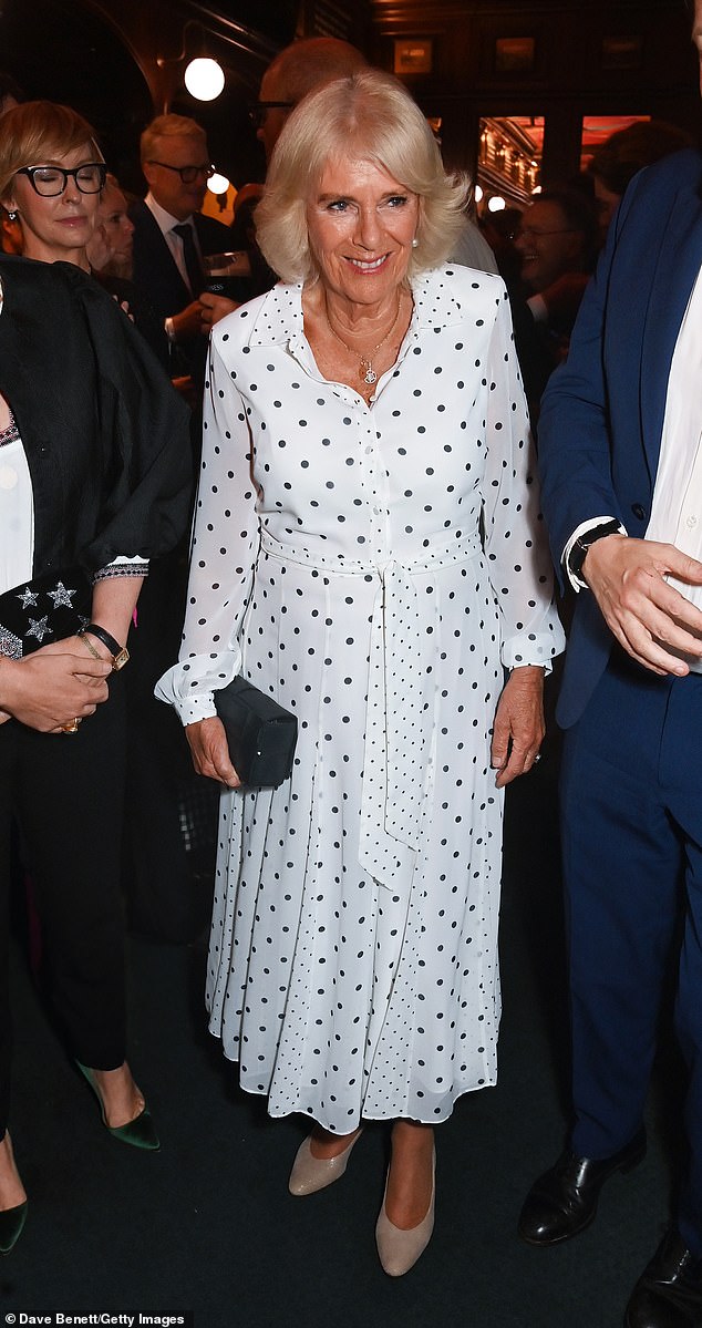 A shirt dress is a year-round wardrobe staple, and Queen Camilla demonstrated that winter doesn't have to mean a palette of black and grey (pictured at a book launch on September 5)