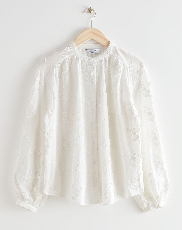 This £87 organic cotton blouse from & Other Stories features beautiful floral detailing and voluminous sleeves, enabling it to be dressed up or down for a variety of occasions