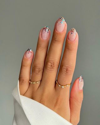 Glitter nails.