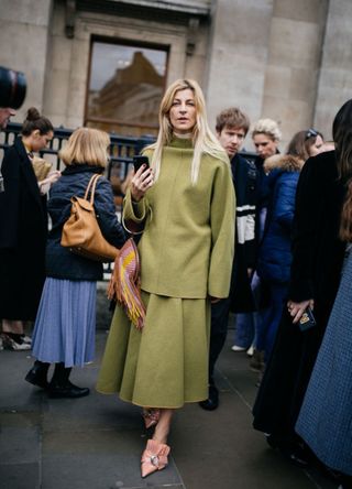 Woman wearing a khaki dress and top