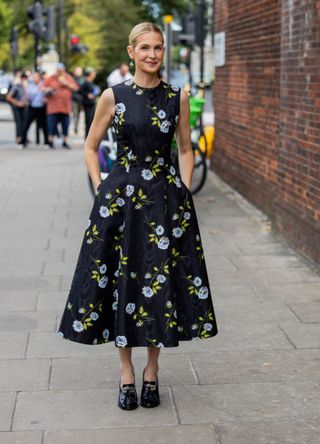 Woman wearing a floral A-line dress