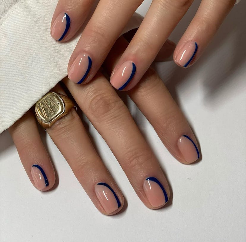 Try simple sapphire blue cuffs on your nails.