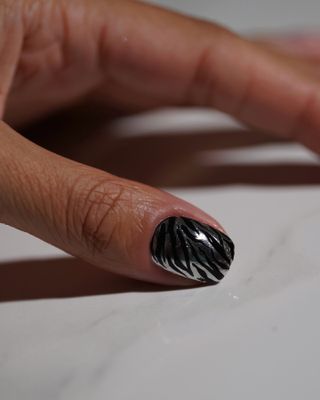 @iramshelton silver animal print manicure