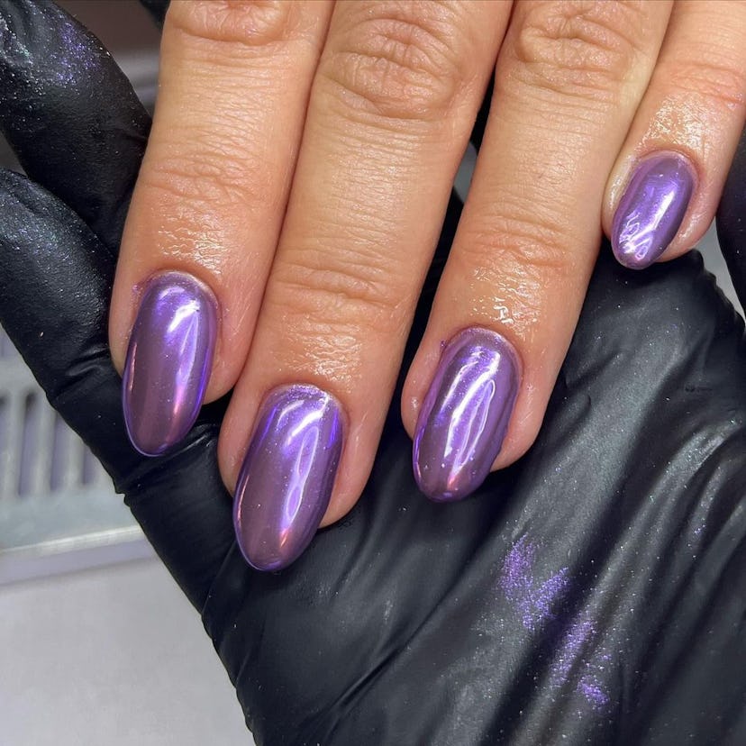 Purple chrome nails are on-trend for winter 2025.