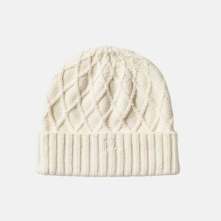 flat lay image of white wool hat