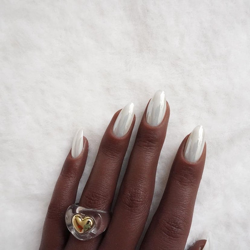 White chrome nails are on-trend for winter 2025.