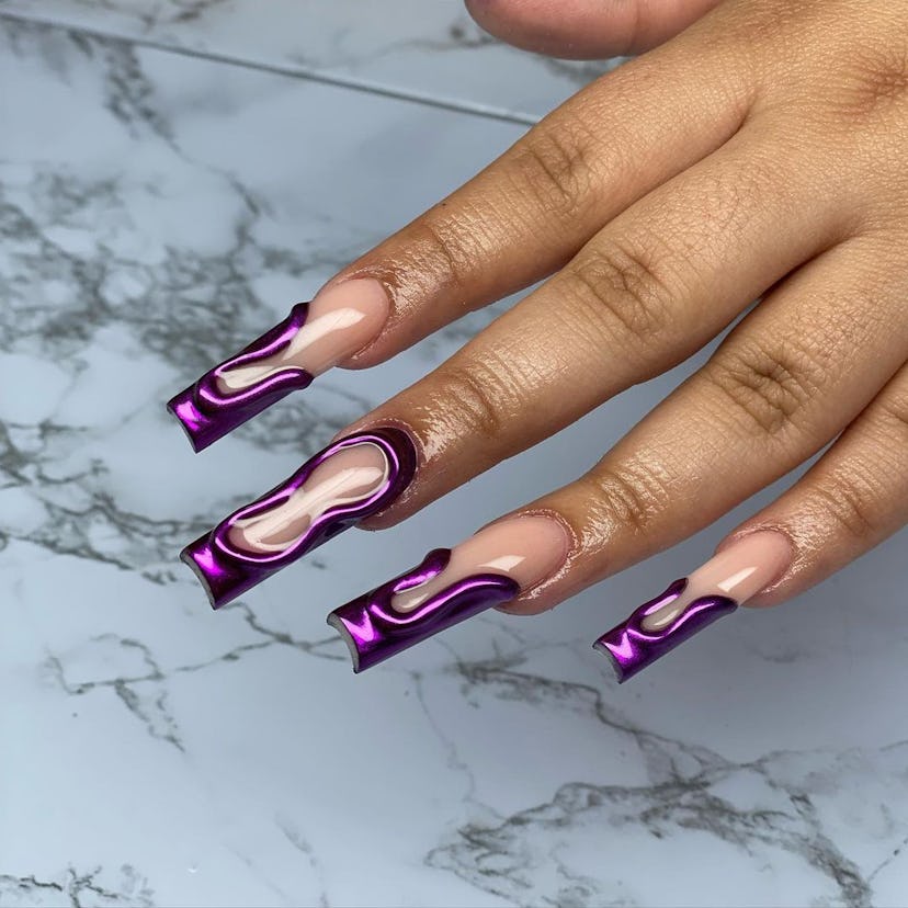 Purple chrome nails are on-trend for winter 2025.