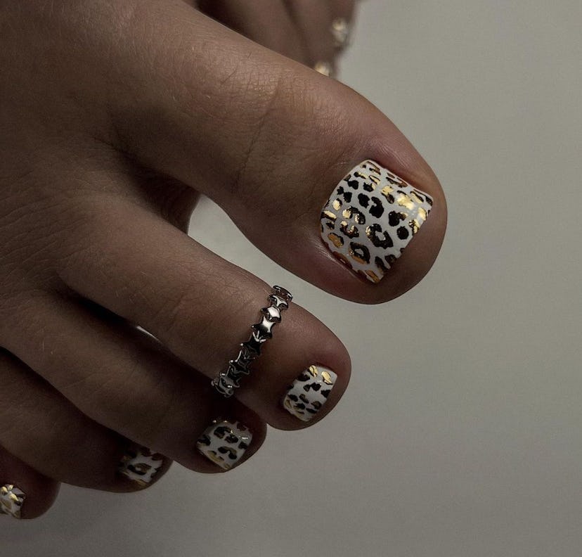 Try a gilded leopard print pedicure for Sagittarius season 2024.