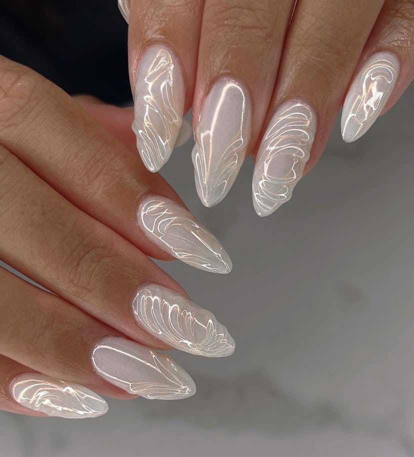 White chrome nails are on-trend for winter 2025.